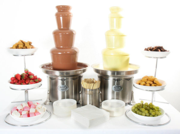 two small commercial chocolate fountains